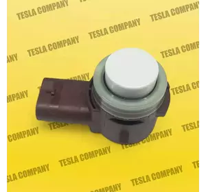Датчик парктроніка бічний білий Tesla Model Y 1127502-11-C Новий оригінал Датчик парктроніка бічний білий Tesla Model Y 1127502-11-C Новий оригінал